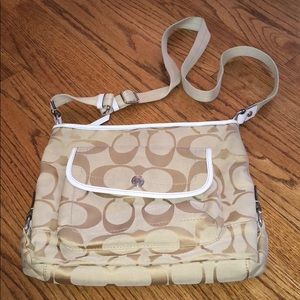 Tan Coach crossbody purse